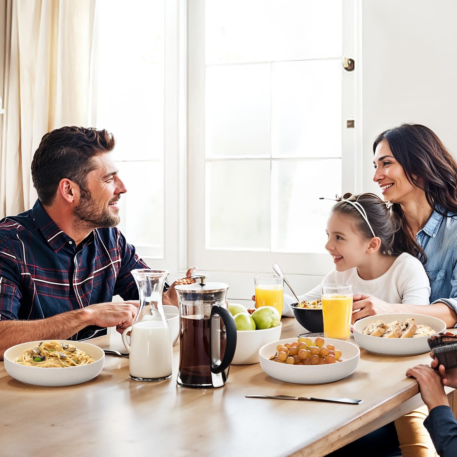 Gencywe serving plate complements the pasta bowls for an elegant table