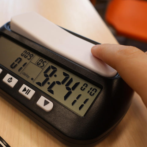Generic Chess Clock in packaging with manual highlights ready-to-use setup