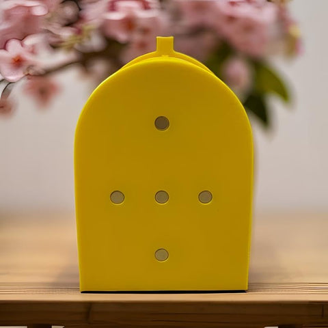 Duck-themed magnet on metal surface offering playful travel-themed decor and gifting ideas.