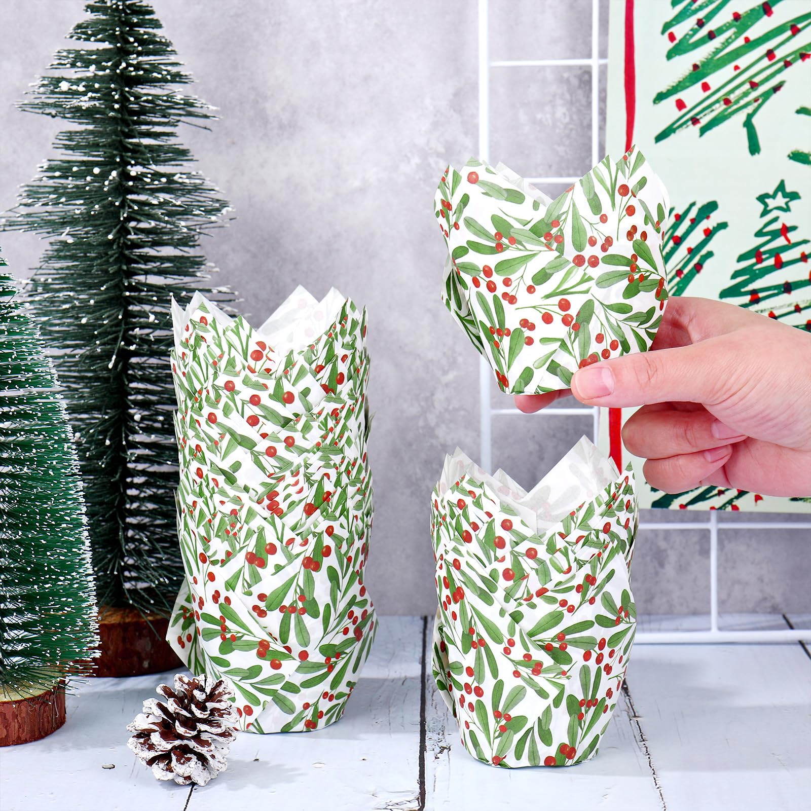 Generic cupcakes showcased on a Christmas table using these wrappers.