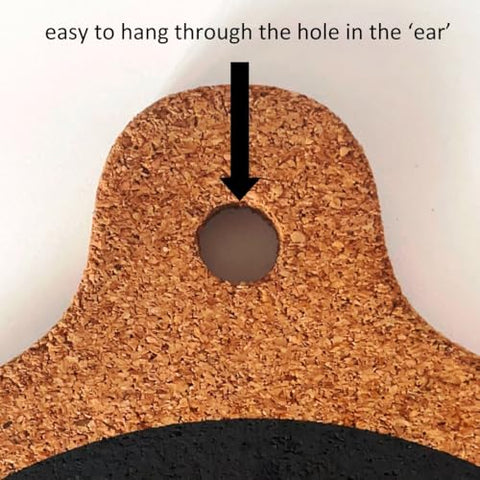 Generic magnet cork-trivet 8in with magnetic ears shows easy detachment