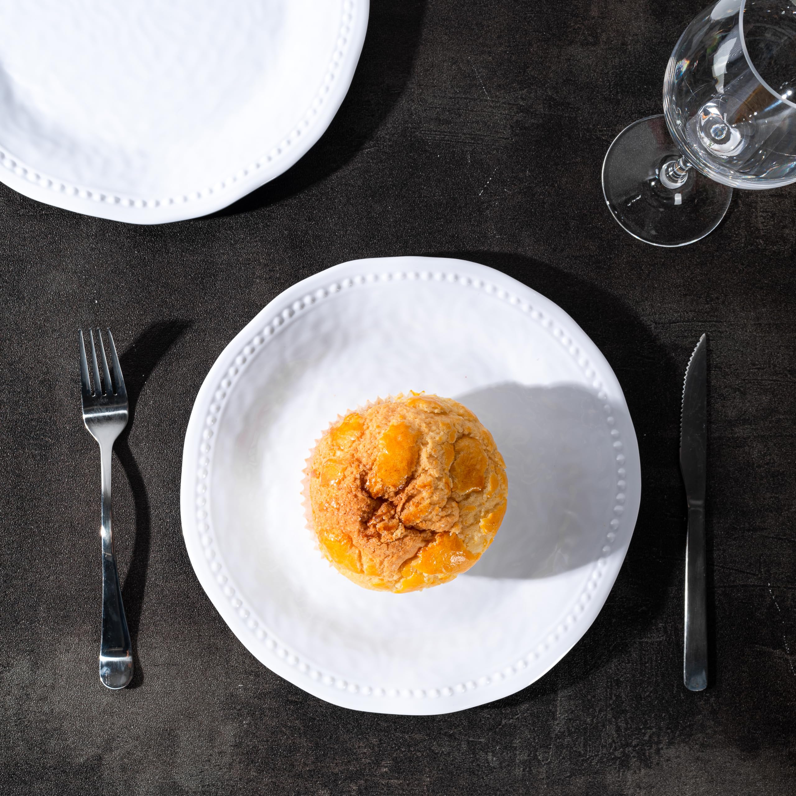 Generic melamine plate with beaded pattern, durable and stylish.