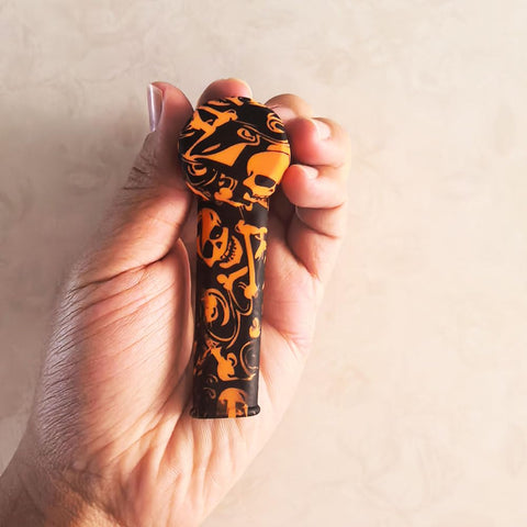 Generic silicone capped orange straw in a travel pocket case for mess-free sipping