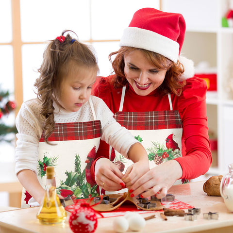 Generic two-pack Christmas cardinal aprons provide backup or gift-ready options.