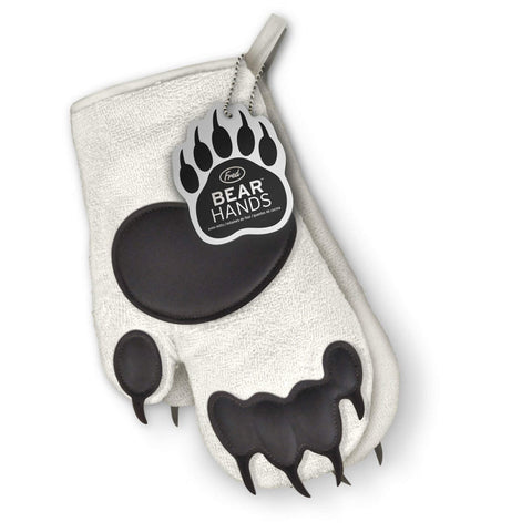 Right and left polar bear mitts worn for fun kitchen moments.