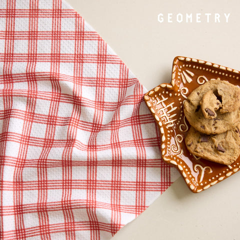 GEOMETRY Christmas dinner napkins styled with festive prints.