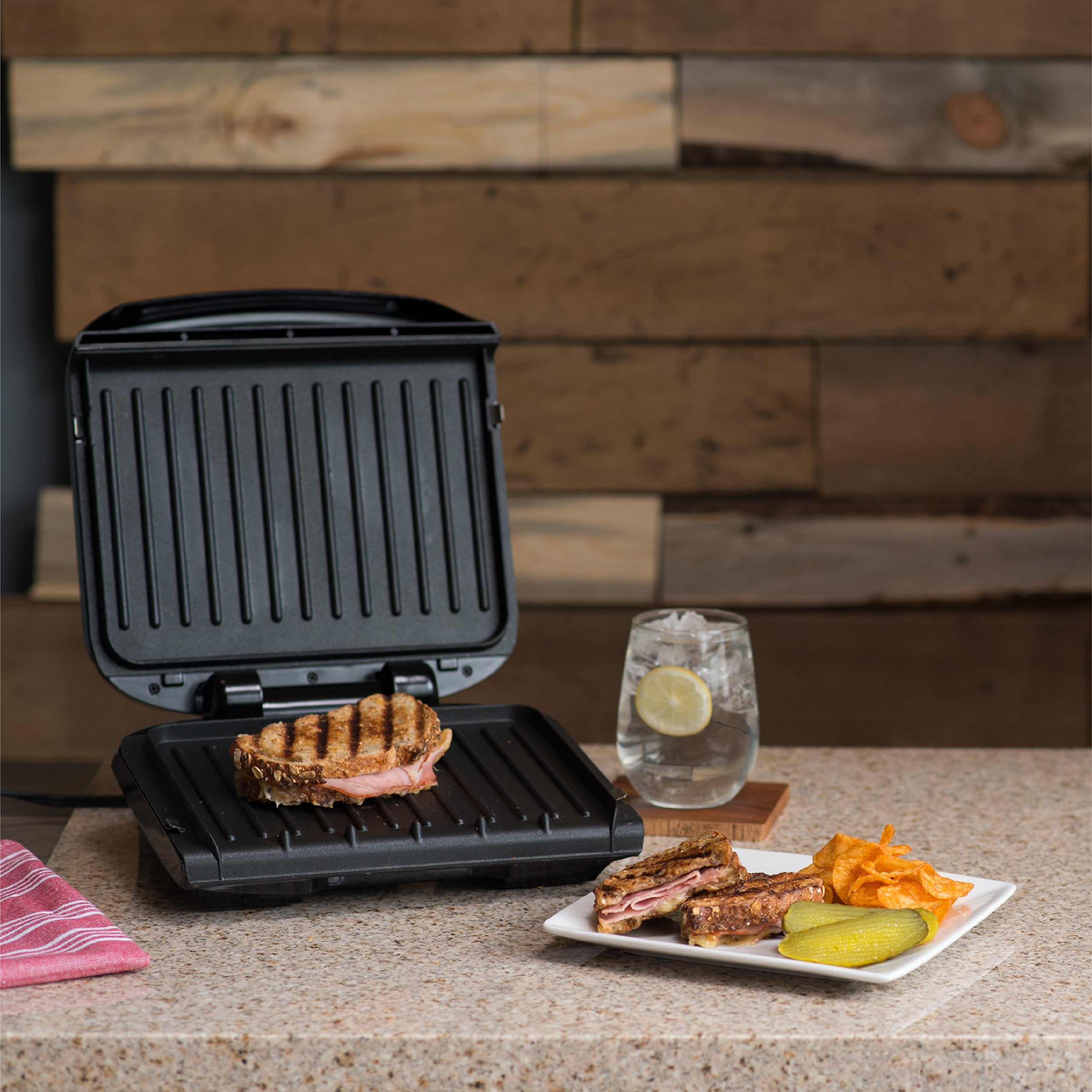 George Foreman grease drip tray catches drips during grilling.