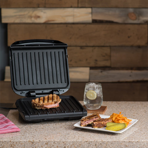 George Foreman grease drip tray catches drips during grilling.