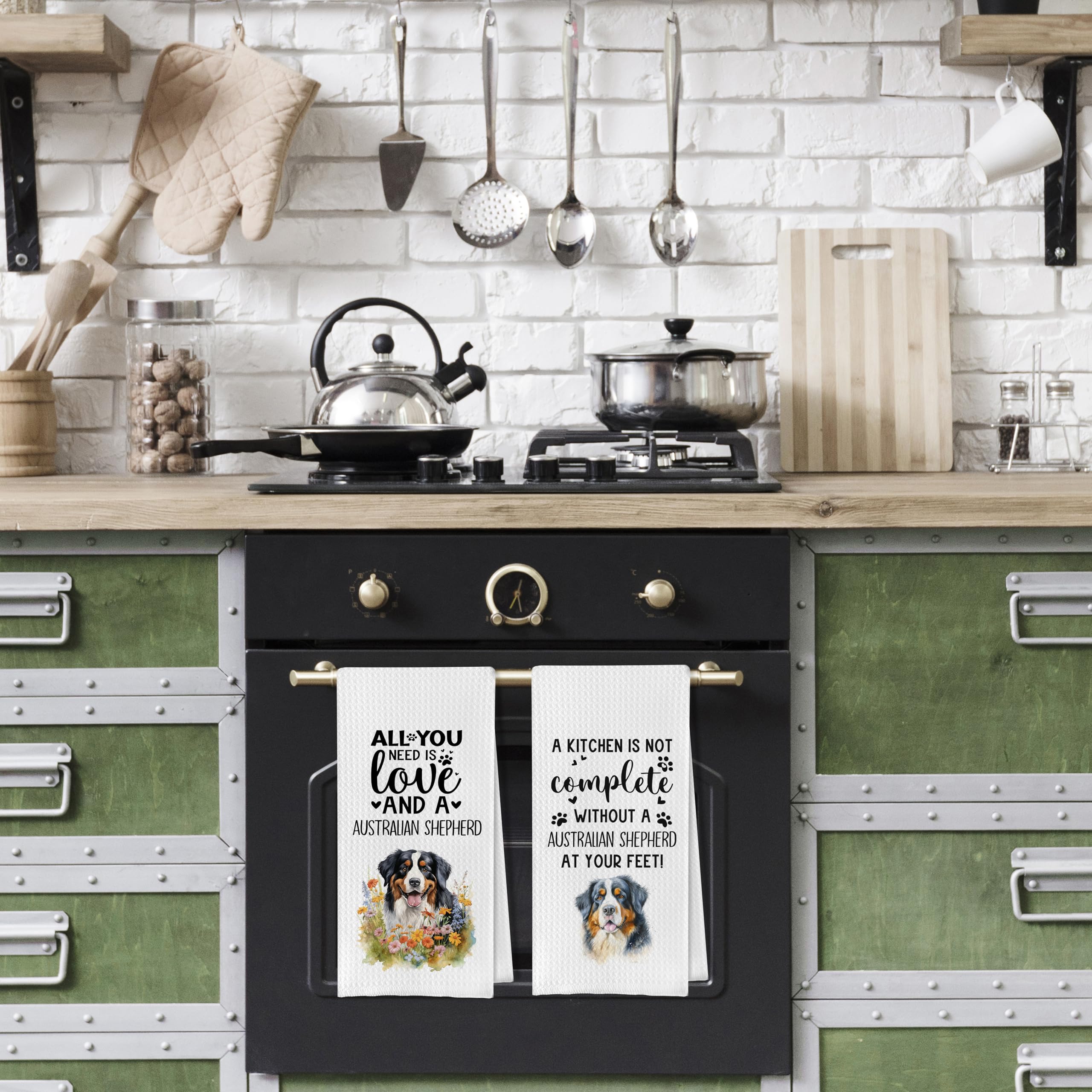 Geqtt towels hanging near oven for easy access and quick cleanup.