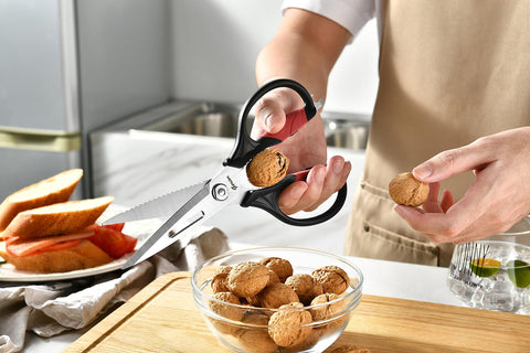 Gerior multi-function scissors include bone-cracking grip and bottle opener.