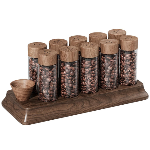 Gernshe single-dose tubes on walnut stand for tidy coffee storage and easy dosing.