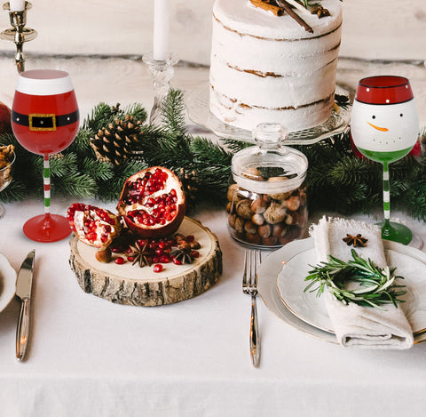 Gift Boutique holiday-decor wine glasses enhance table presentation.