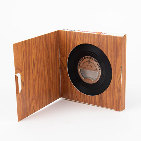 Gift Republic vinyl record-shaped bottle opener close-up highlights stainless steel opener