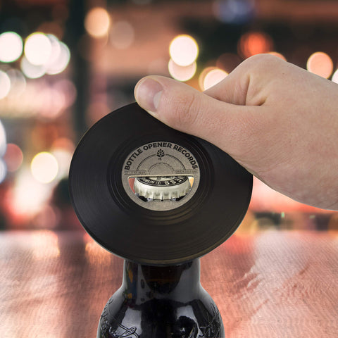 Gift Republic vinyl record-shaped bottle opener in use demonstrates easy cap removal