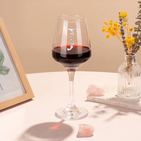 Close-up of GiftHarbor engraving on monogrammed wine glass