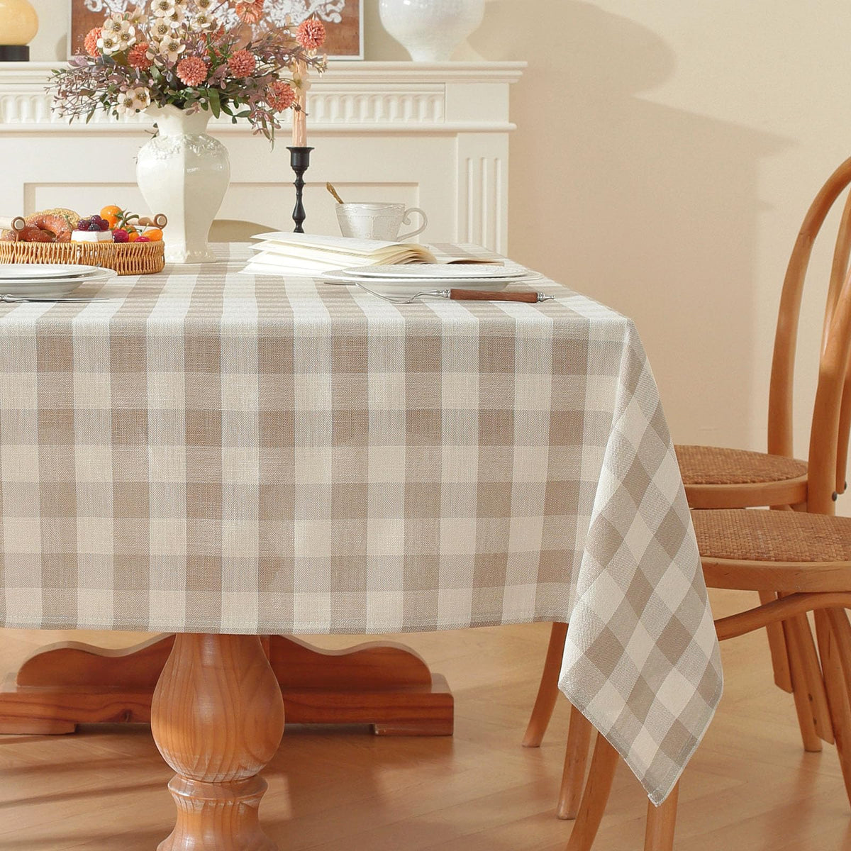 Gillhov checkered tablecloth in beige and white for elegant dining use.