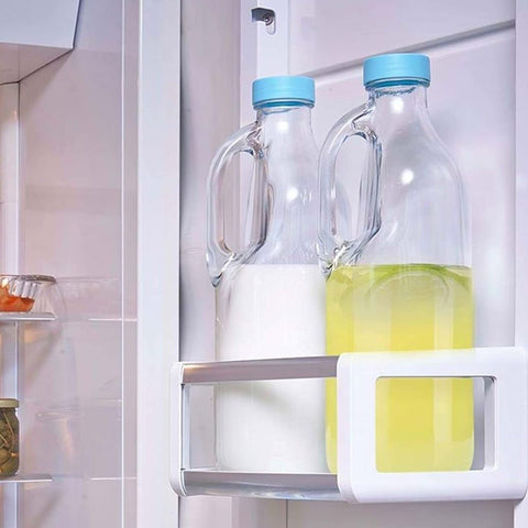 GLASS MONGER airtight leakproof lids shown on clear pitcher for spill protection.