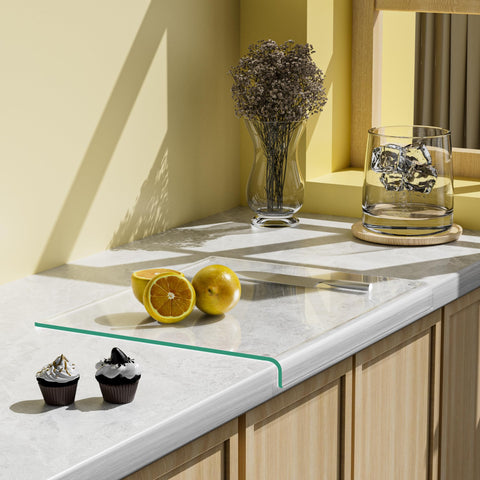 GlassCuisine curved tempered glass cutting board with lips for stable chopping.