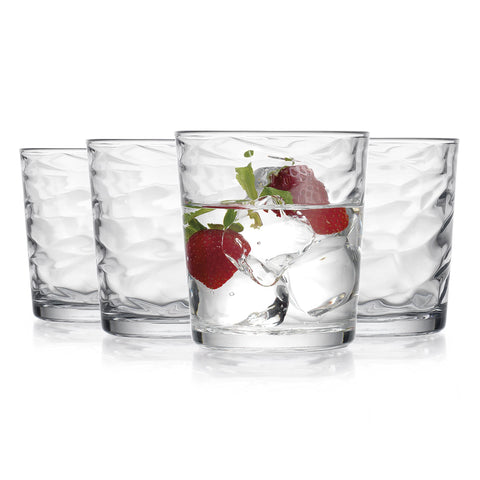 Glaver's glasses cast geometric shadows for a dramatic table vibe.