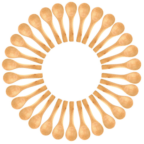 Gleihow mini wooden spoons laid flat beside a scrub jar for precise scooping