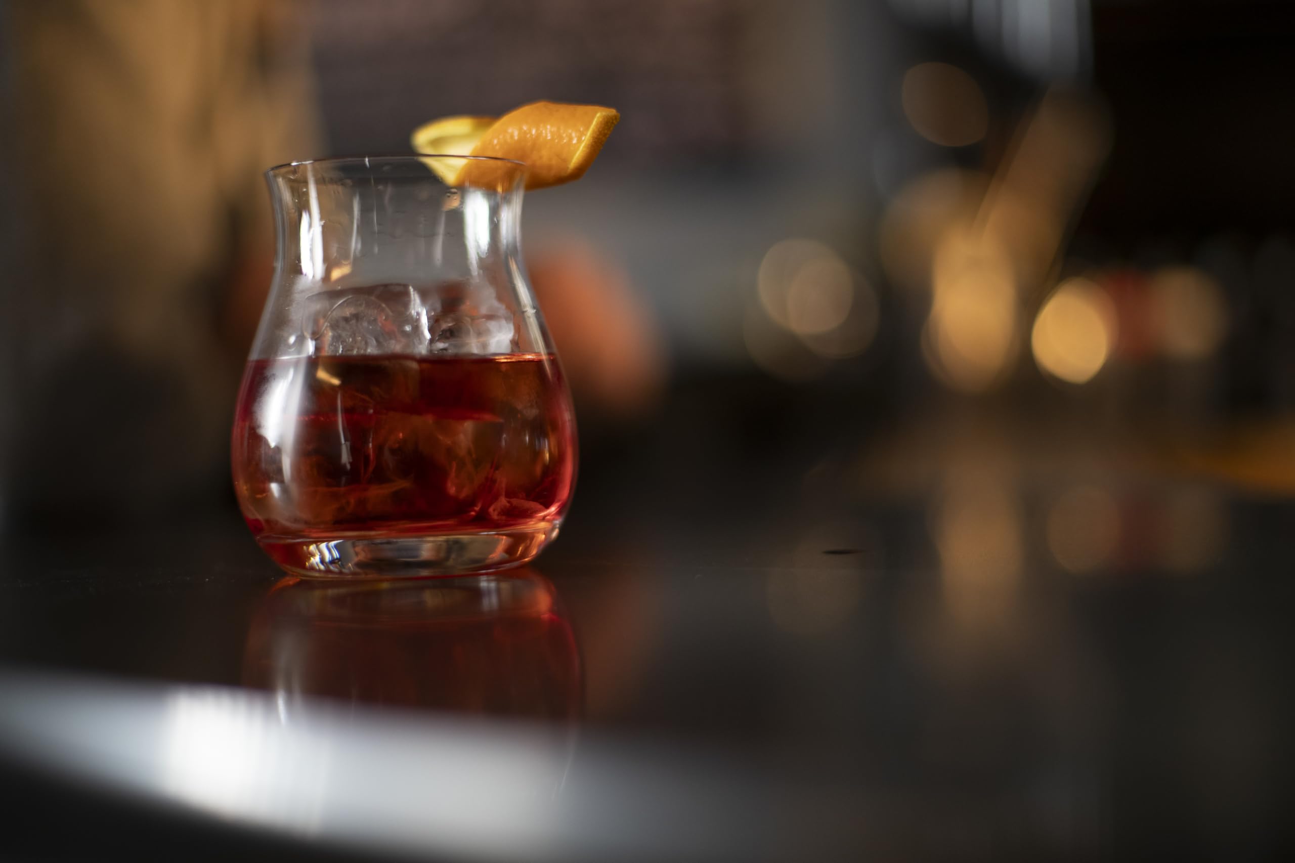 Glencairn mixer glass with ice and garnish for ideal serve setup