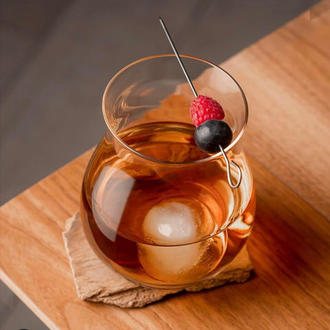 Glencairn mixer glass in use with whiskey showcases aroma and garnish space