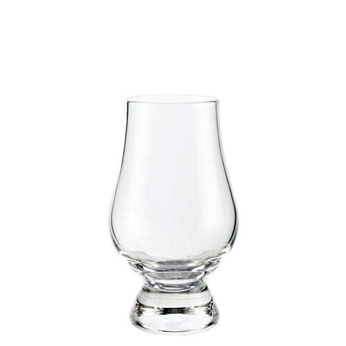 Pouring whisky into Glencairn Wee glass to capture aroma and color.