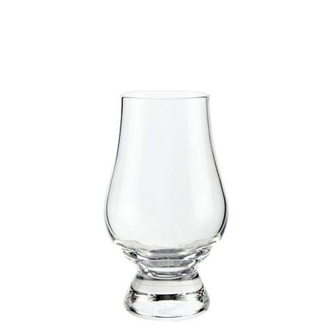 Pouring whisky into Glencairn Wee glass to capture aroma and color.