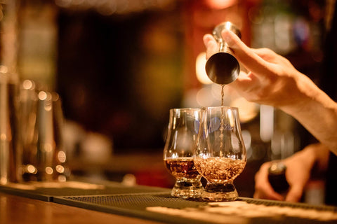 Glencairn whiskey glass wide bowl highlights color and aroma