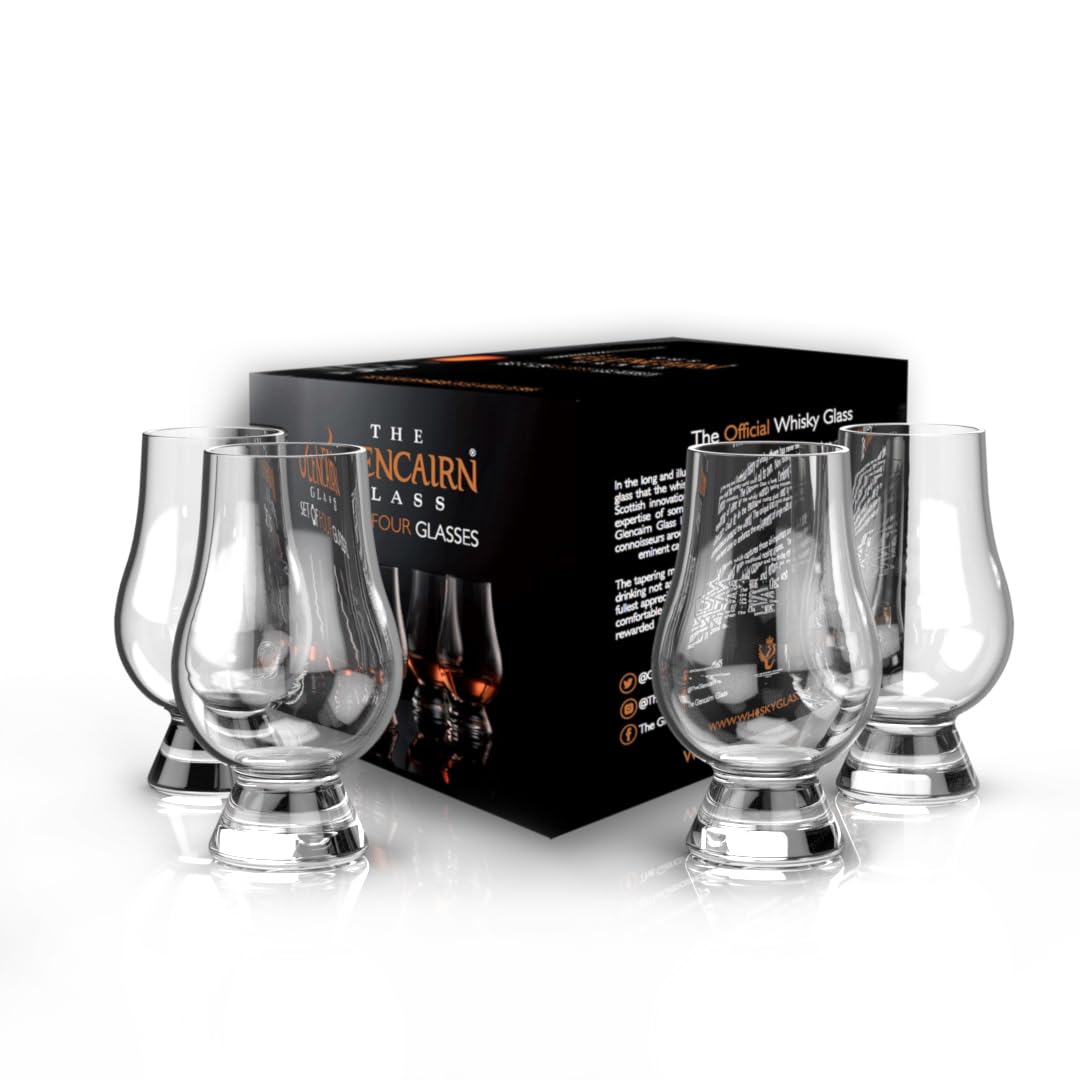 Glencairn whisky glass set of 4 on wooden bar, ideal for tasting sessions.
