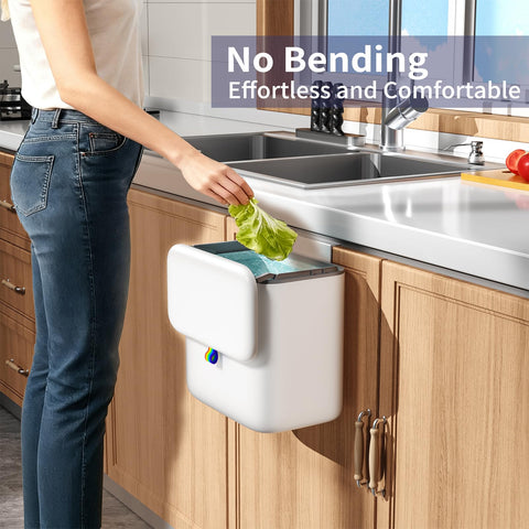 Gleynest compost bin stored under sink for discreet waste management.