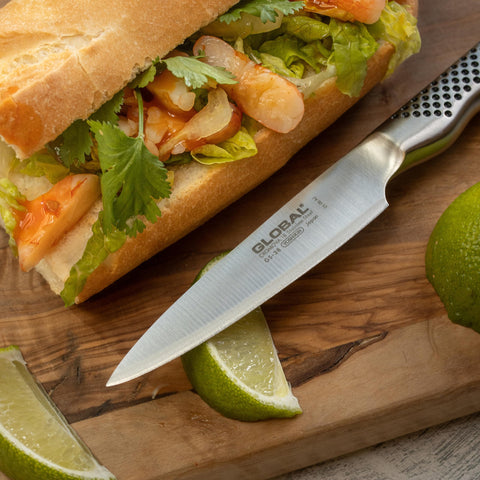 Global 3-1/2 inch paring knife blade close-up showing lightweight stainless steel construction.