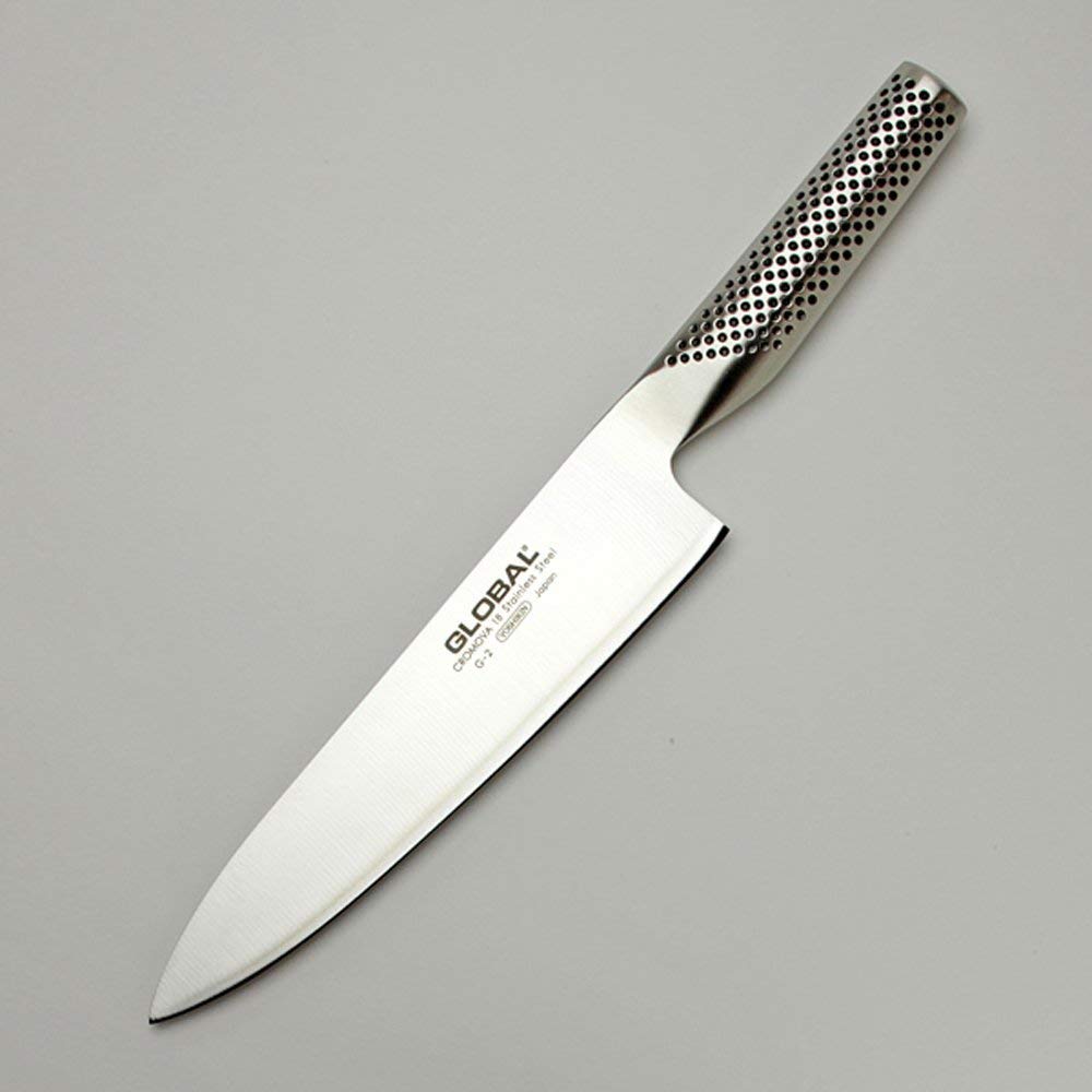 Global 8-inch chef knife face-ground blade for refined slicing.