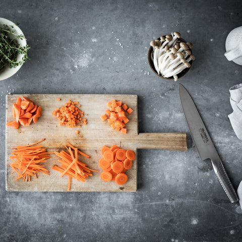 Global 8-inch chef knife lightweight design reduces hand fatigue.