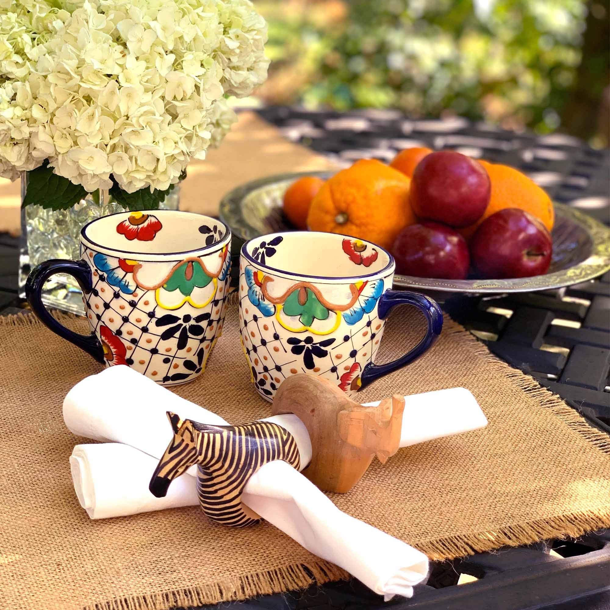 Global Crafts mahogany animal napkin ring set enhances tables with coordinated safari style