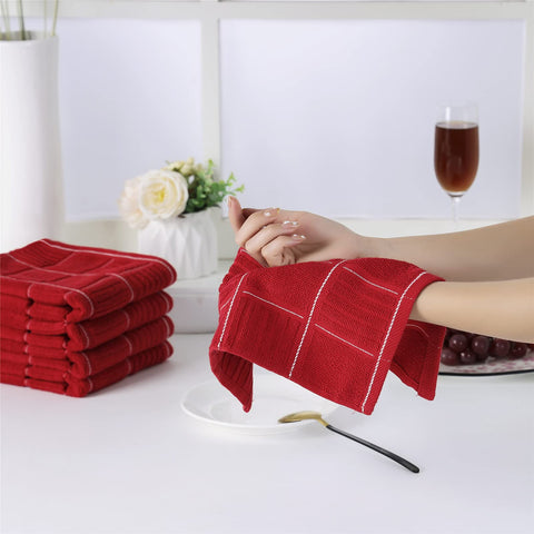 Glynniss red commercial-grade towels withstand frequent washing and still stay fluffy.
