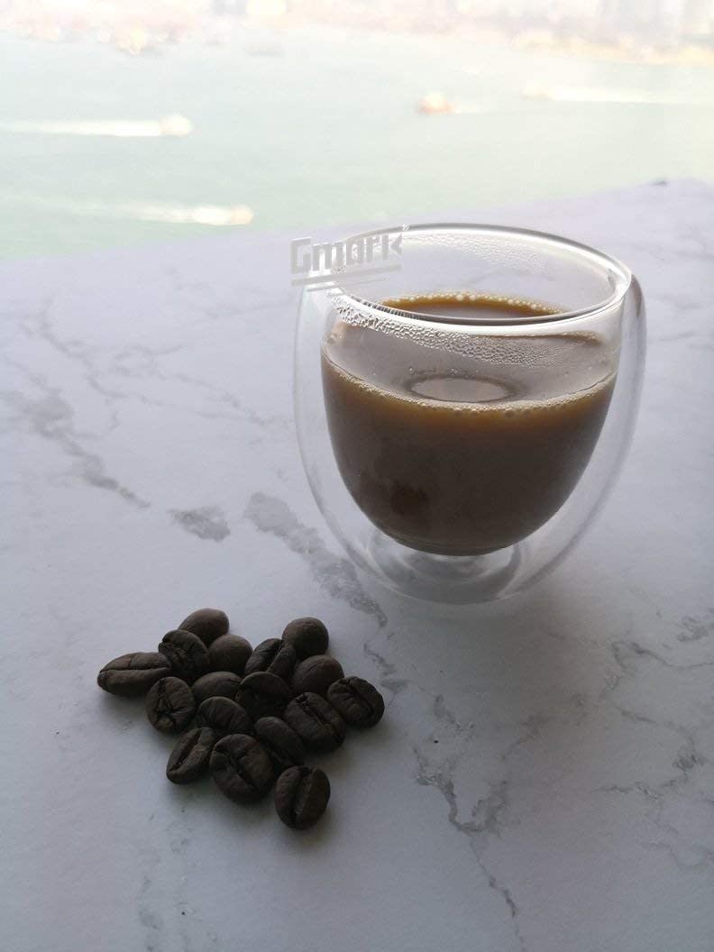 Gmark party-ready desserts and canapes presentation with stylish glassware.