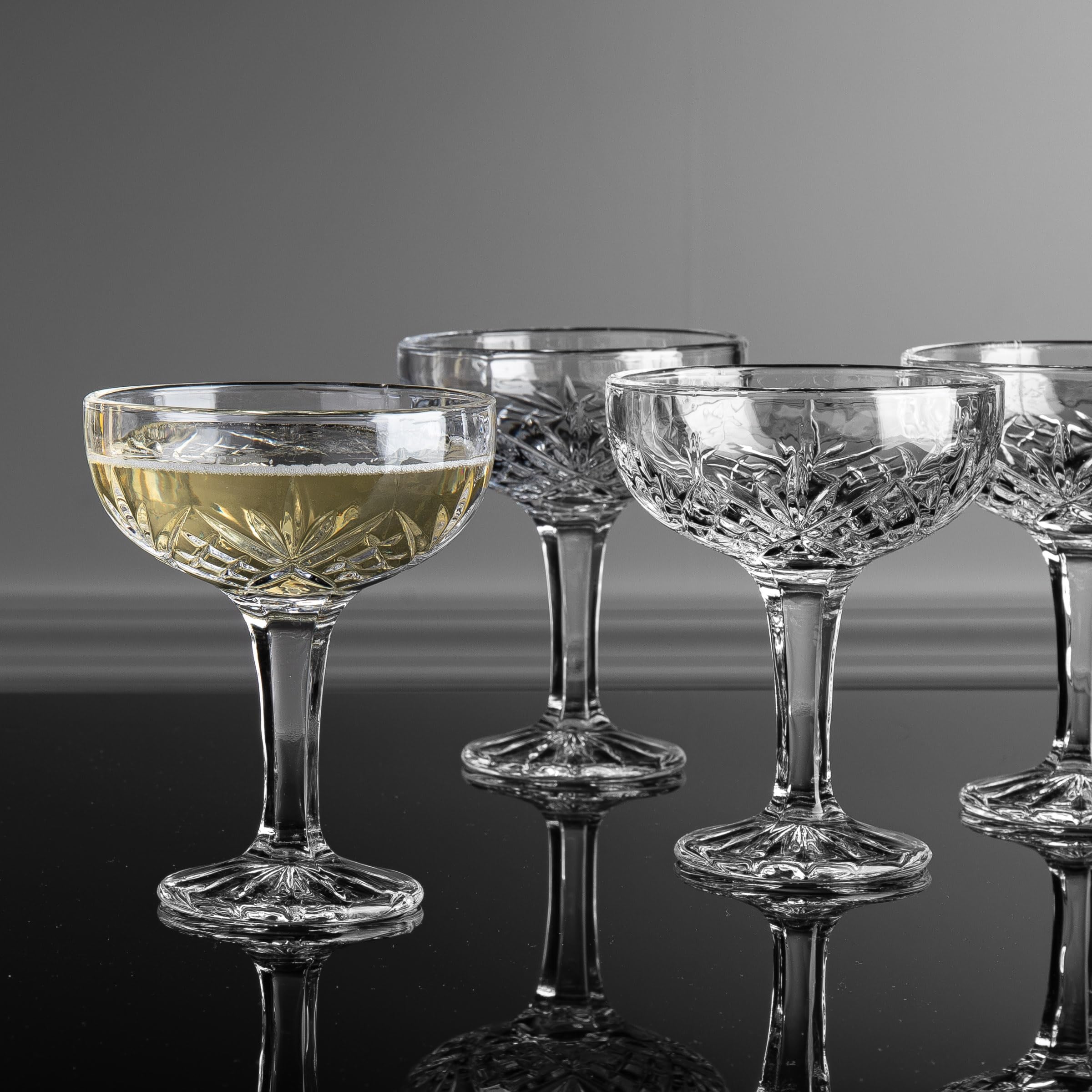 Godinger Dublin champagne glass side view showing classic coupe shape.