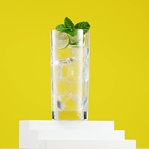 Godinger tall cylindrical glass with thick base for stable pouring.