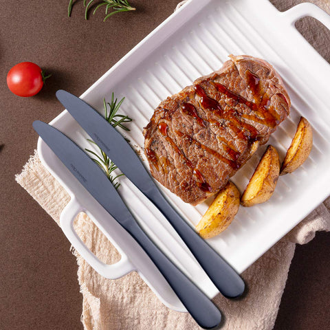 GoGeiLi matte black dinner knife on a modern dining table setting