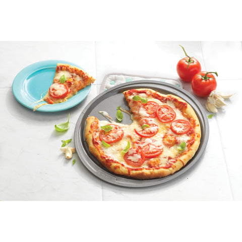GoodCook pizza pan safe for metal utensils and serving.