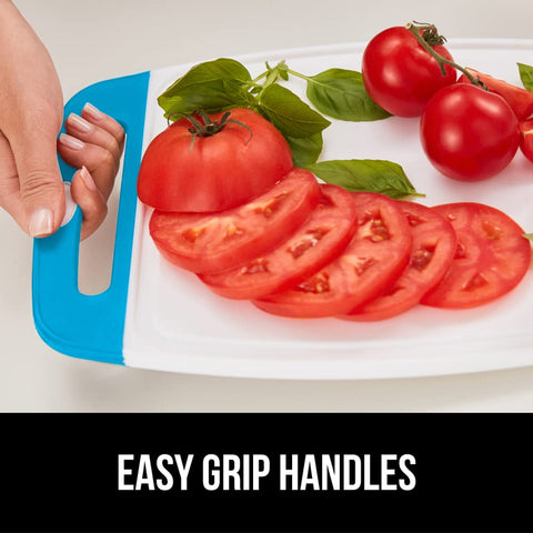 Medium and small boards provide versatile prep for veggies and proteins in Aqua.