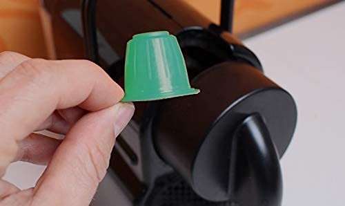 Gourmesso original line compatibility with cleaning capsules for broad machine support.