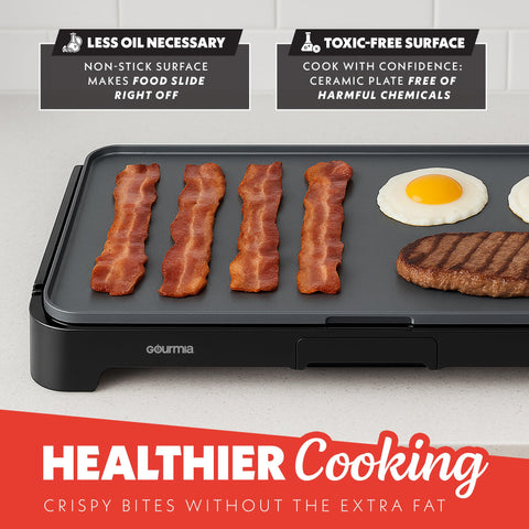 Gourmia 22in XL griddle pull-out drip tray for mess control.