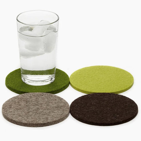Graf Lantz Bierfilzl forest coasters set on table protect surfaces.