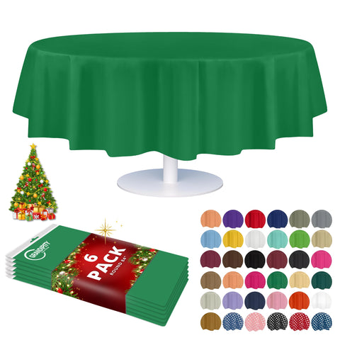 Grandipity green round 84in disposable tablecloth laid on a table for quick coverage