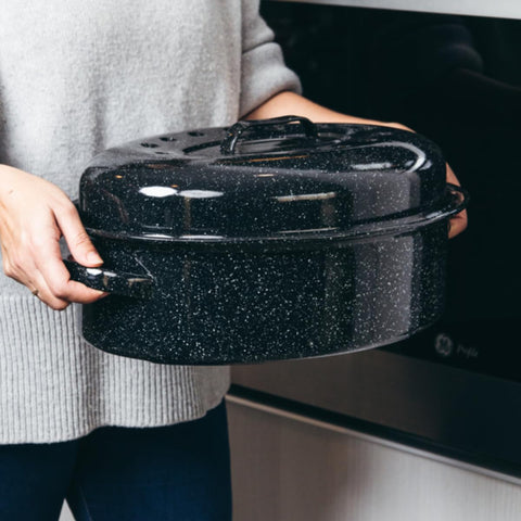 Granite Ware dishwasher-safe enamel roaster cleans easily after family meals.
