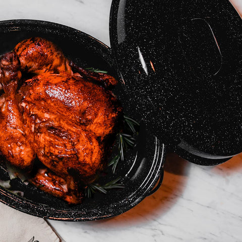 Granite Ware roaster demonstrates even heat distribution for dependable roasts.