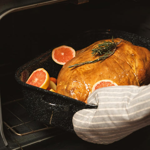 Granite Ware lid doubles as a separate roaster for versatility