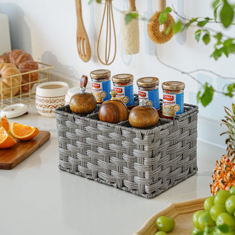 Granny Says wicker utensil caddy on kitchen table simplifies party serving.